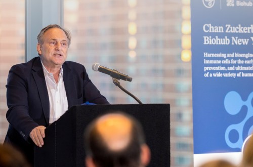 Andrea Califano, president of CZ Biohub NY stands at a podium.